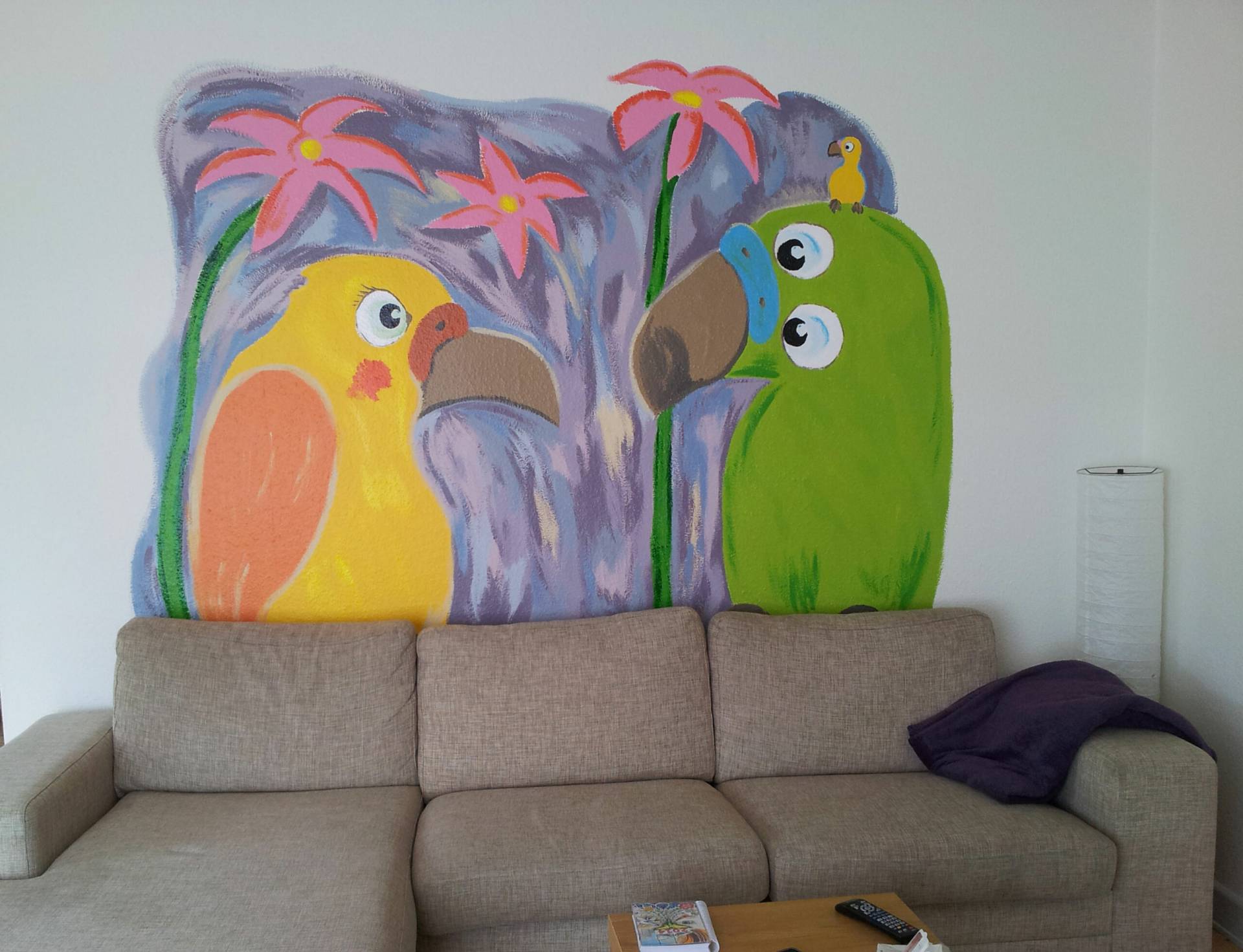 Vægmaleri over sofaen